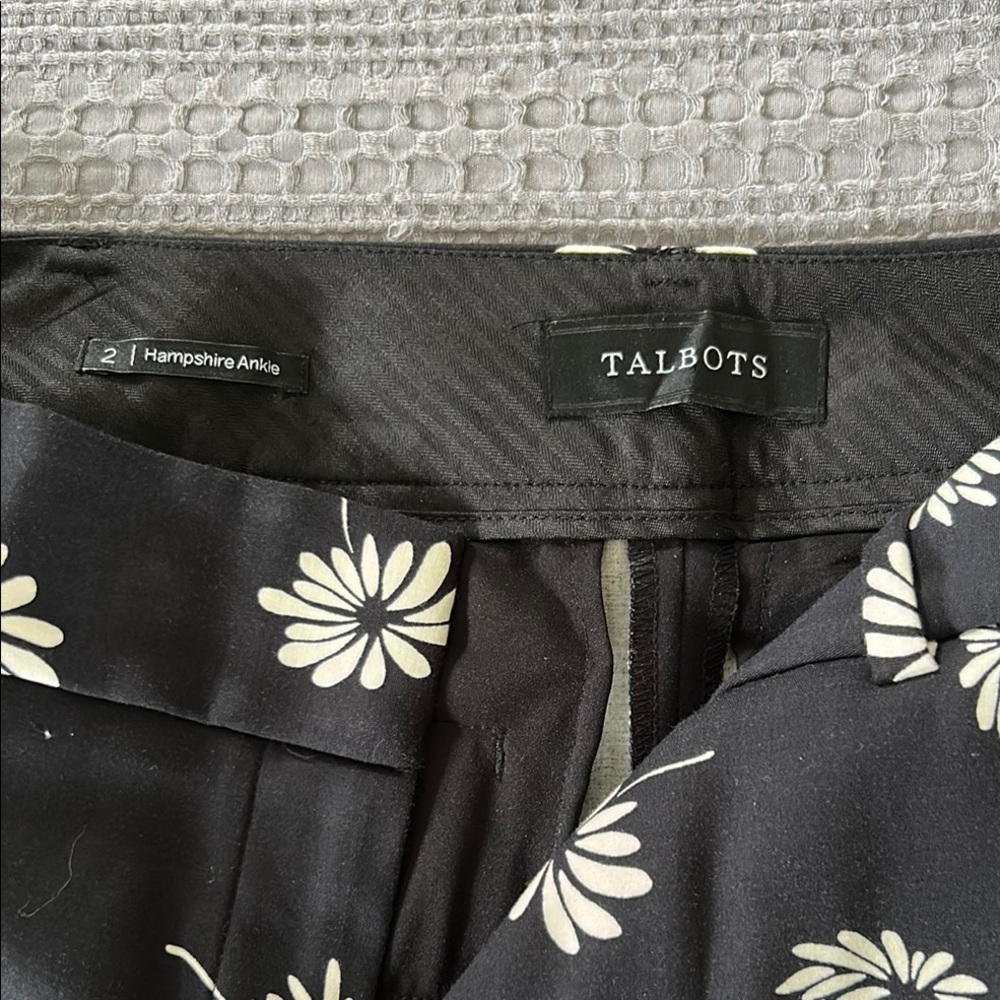 Talbots Black ankle length pants with Cream Floral Design. Excellent condition!